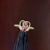 Anillo de Quinceañera Corona de Gala en Oro Amarillo de 10K con Circonias Marquise y Baguette